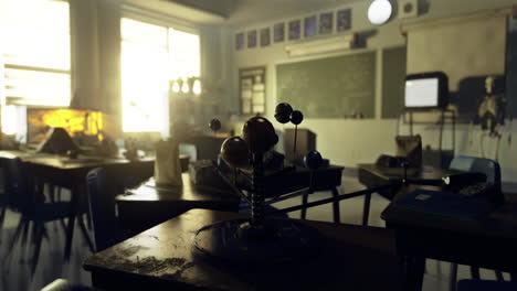 classroom with natural light highlighting a science model on a desk