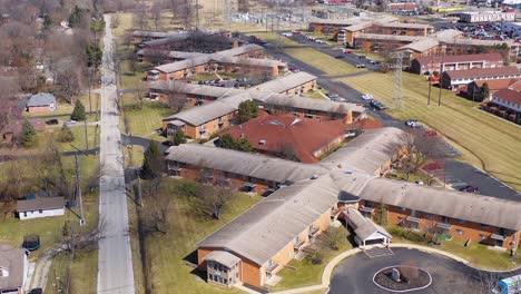 aerial of interesting patterns of houses or apartments forming an x shape