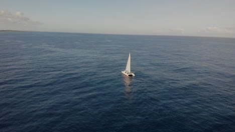 Isolated-View-Of-A-Luxury-Catamaran-Boat-Sailing-In-The-Serene-Ocean-Of-Puerto-Rico