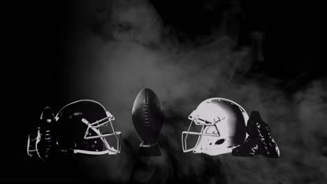 Animation-of-smoke-with-american-football-equipment-with-ball