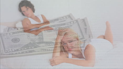 animation of dollar banknotes over caucasian couple