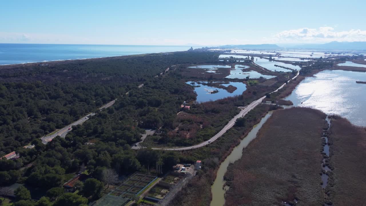 4K Aerial View of Albufera of Valencia with Forest, Mediterranean Sea, and Water-filled Lagoons
