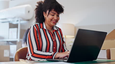 Boxes,-business-and-woman-with-a-laptop