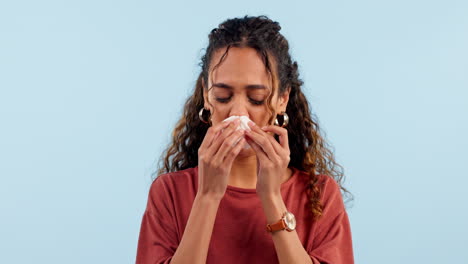 sneeze, face and sick woman in studio with tissue