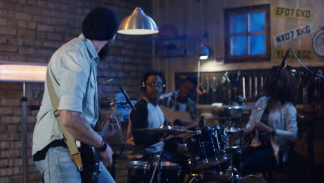 band rehearsing in a home studio