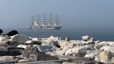 fully rigged all ship slowly sailing in the mediterranean sea