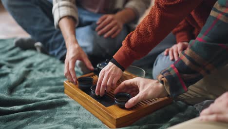 friends enjoying a cozy tea ceremony