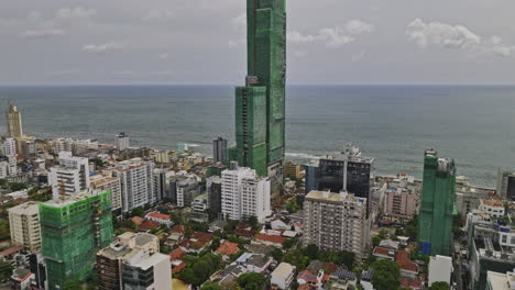 colombo sri lanka aerial v24 drone flyover 606 the apartment at bambalapitiya, waterfront luxury residential apartment under construction with indian ocean views - shot with mavic 3 cine - april 2023