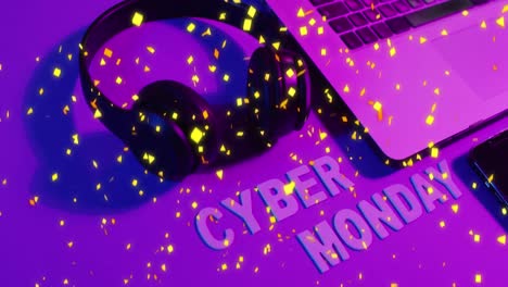 Animation-Von-Konfetti,-Die-über-Cyber-Monday-Text,-Laptop-Und-Kopfhörer-Auf-Violettem-Hintergrund-Fallen