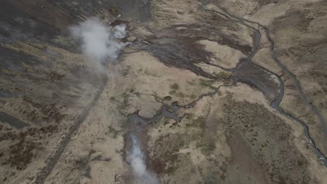 fumaroles and thermal waters at reykjadalur in iceland