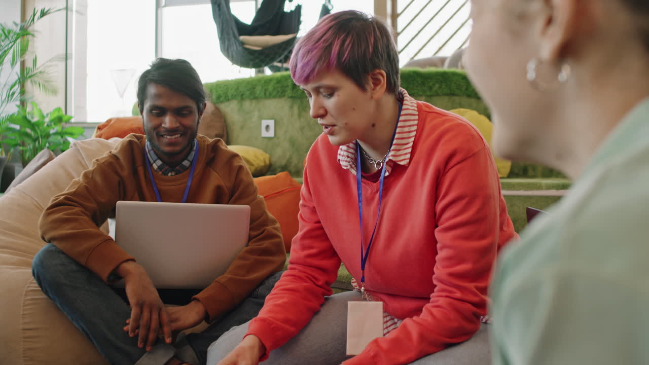 Slowmo Shot of Start-Up Workers Discussing Project