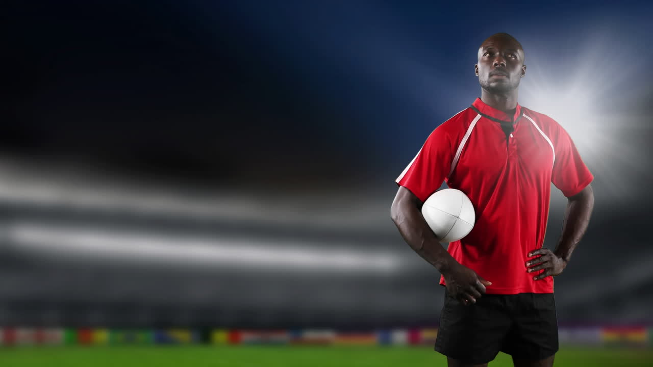 Jogador de rugby profissional de pé em frente a um estádio