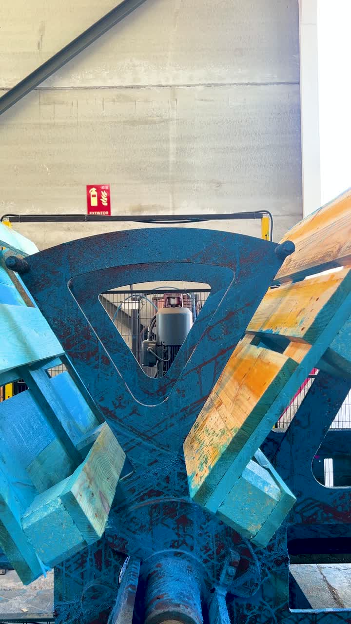 close up of a turning palet machine while in production of Chep units