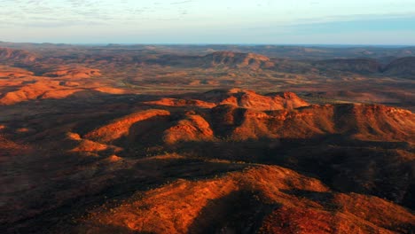 rugged landscape on the wilderness of alice springs during sunny day in northern territory, australia