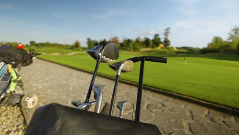 Cinematic-shot-of-professional-sport-golf-clubs-in-the-bag-on-the-empty-golf-course