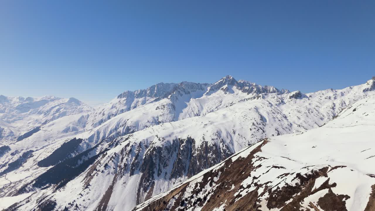 Drone Footage flying from Disentis-Sedrun Cuolm da Vi towards Piz Nair