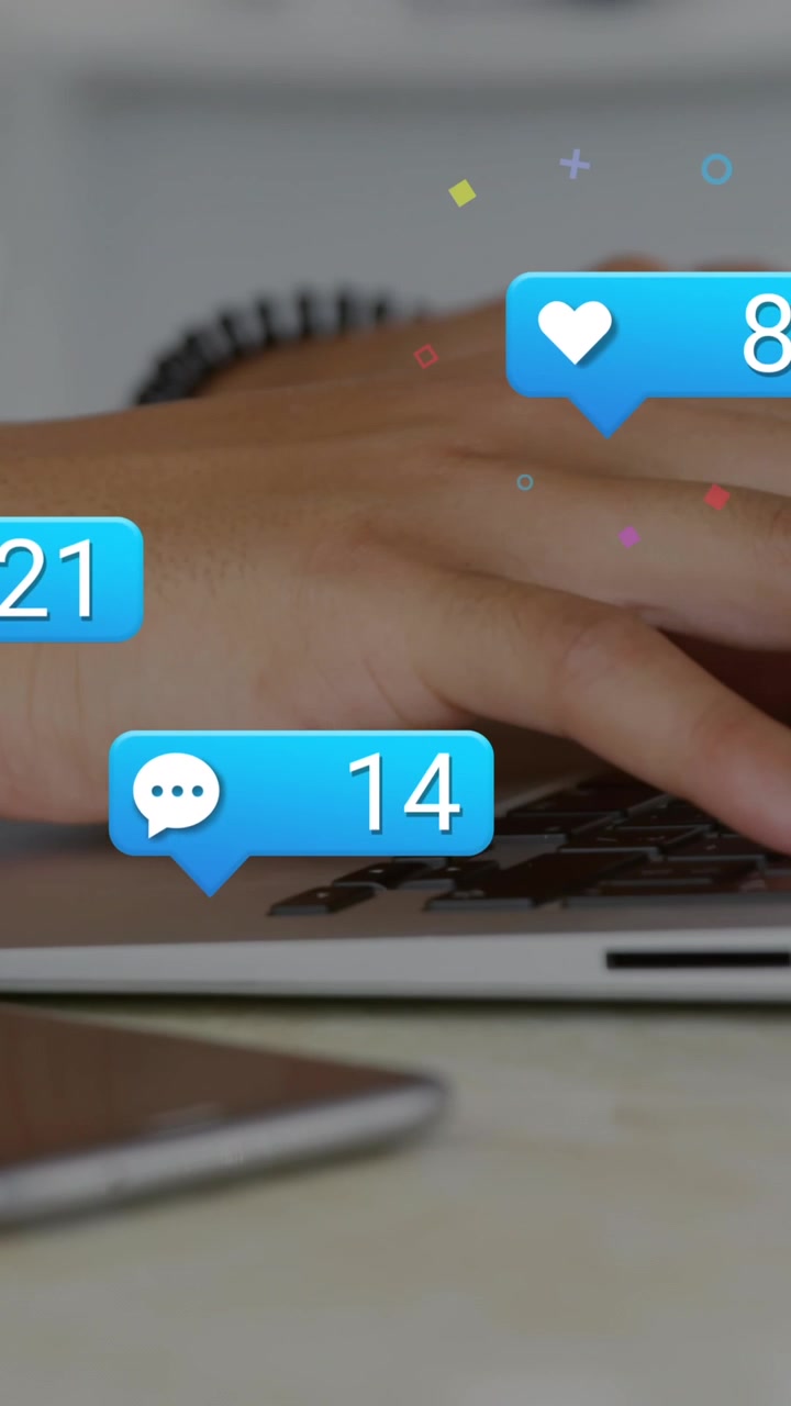 Animation of changing numbers, icons in message boxes, cropped hands of caucasian man using laptop
