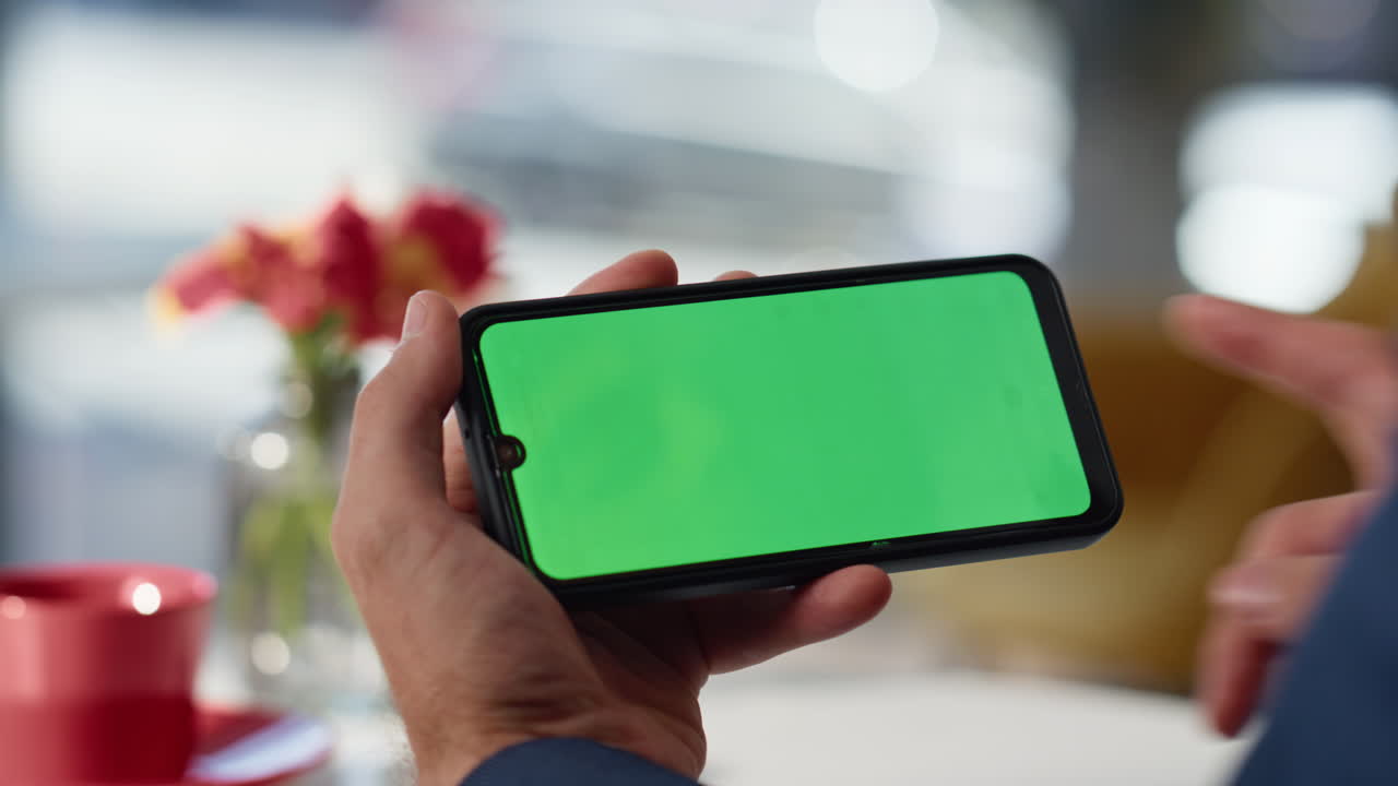 Hands scrolling chromakey mobile phone choosing purchases at restaurant closeup