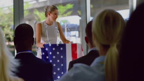 businesswoman raising her hand in a political campaign  seminar 4k