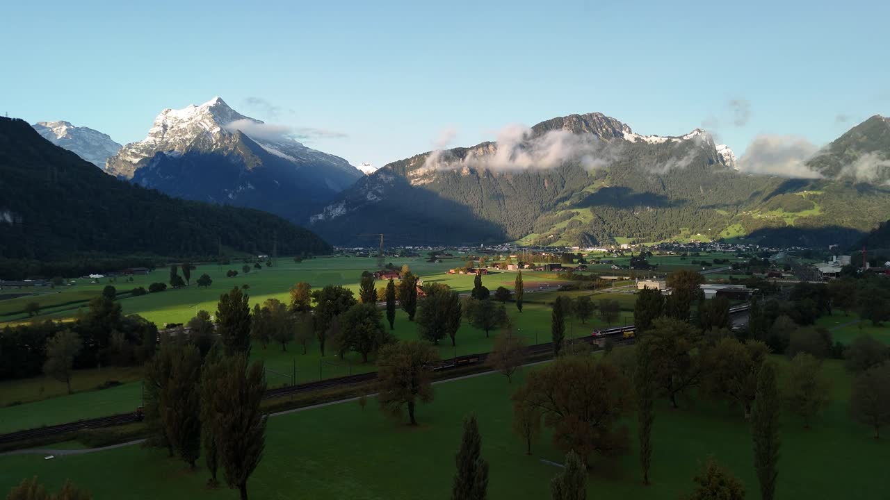Swiss Alps mountains valley landscape, aerial Switzerland nature highlands