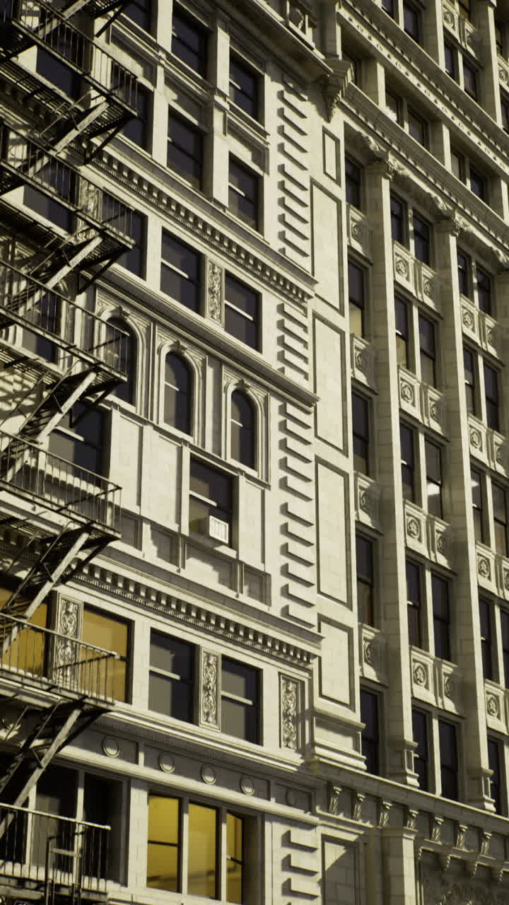 Historic building with intricate architecture under a moody sky in the city