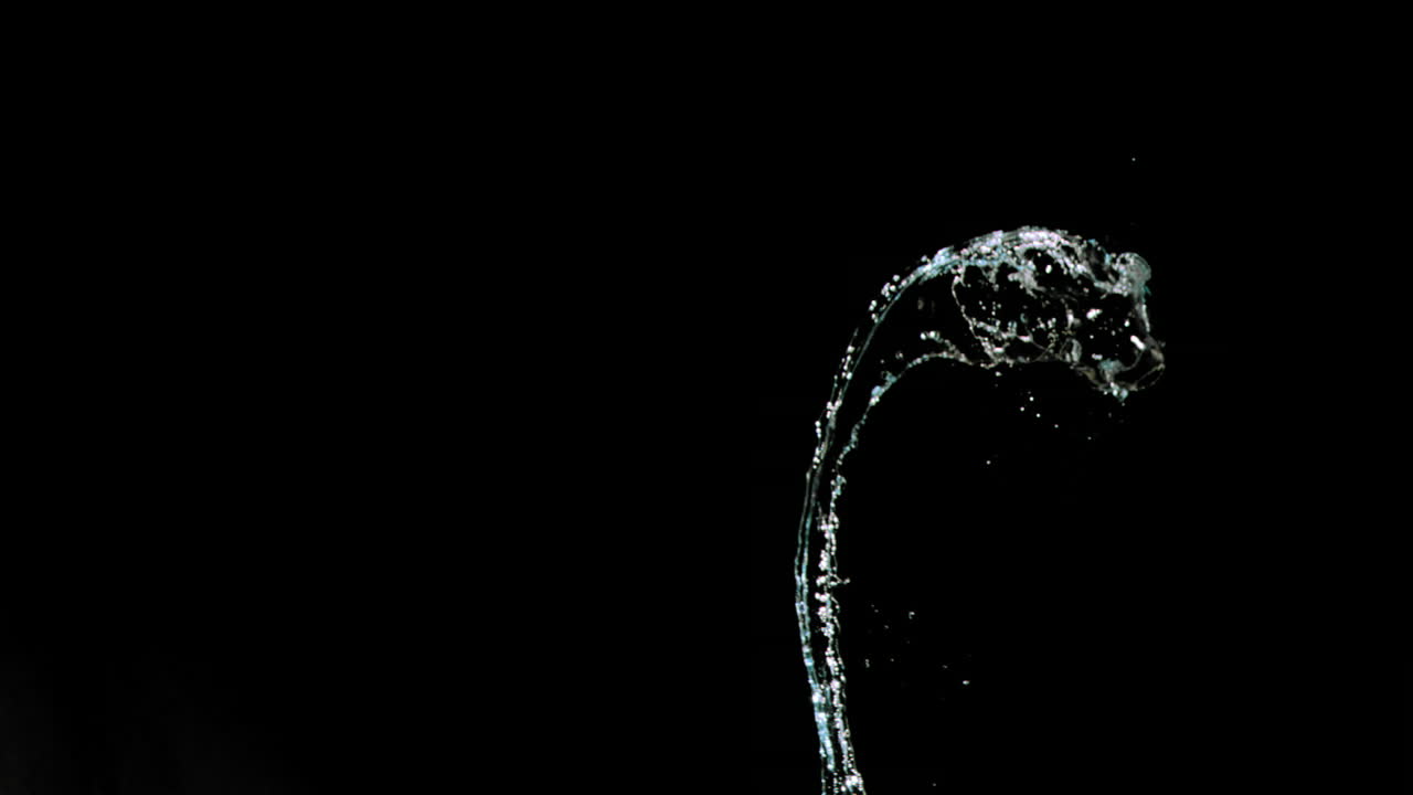 Water in super slow motion splattering
