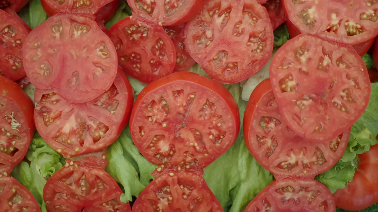 Sliced tomatoes on lettuce