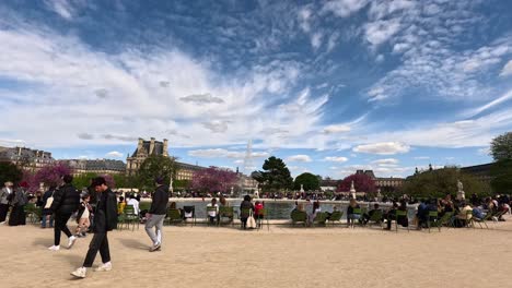 people enjoying a sunny day in paris