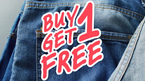 animation of buy 1 get 1 free text over denim trousers background