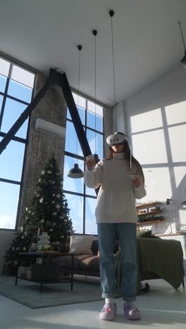 woman using vr headset in a modern living room during christmas