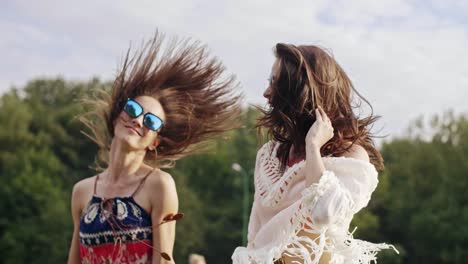 crazy young women dancing on fresh air