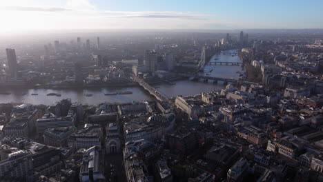 dolly back aerial shot over covent garden and kingsway the strand central london