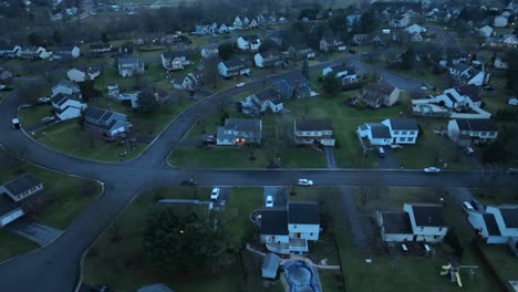 luxury american suburb neighborhood at dusk in winter