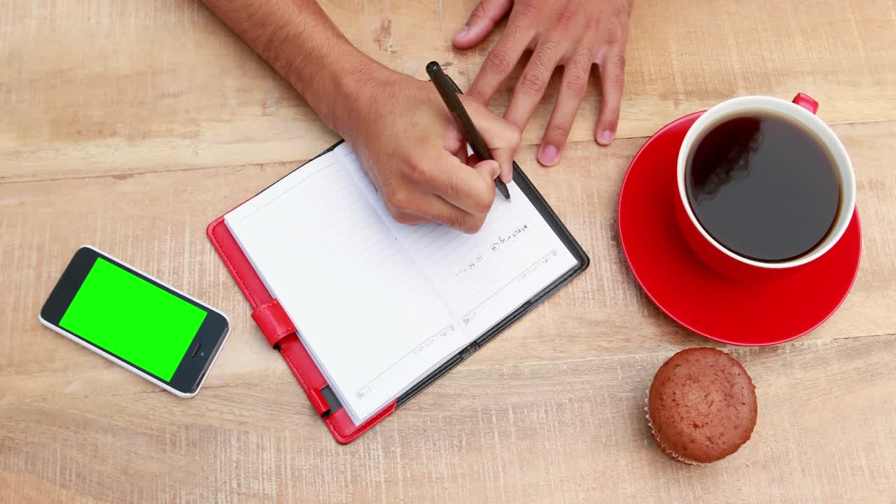 Overhead of man working at desk