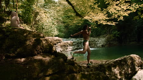 forest river scene with people