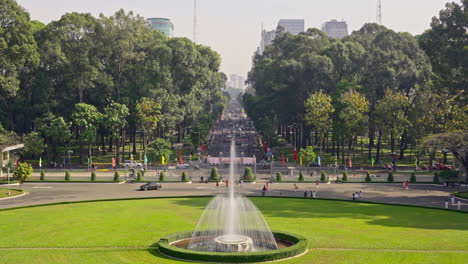 a fountain in the garden of the independence palace in saigon in the morning