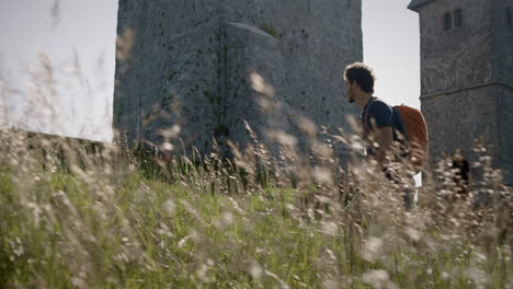 side lower shot of man walking in the