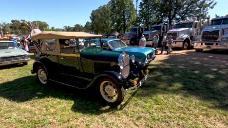 vintage cars displayed at outdoor event