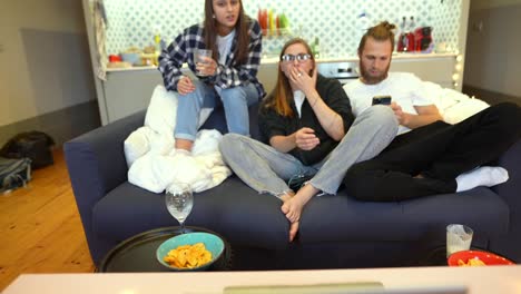 friends watching a movie on a laptop