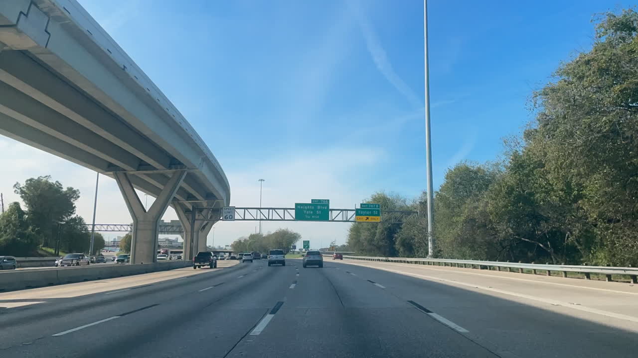 TimeLapse Driving Car Through Downtown Houston on Freeway I45. Drive car on the freeway timelapse. POV driving timelapse through Downtown Houston. Timelapse Drive on Interstate I 45 and  I 10.