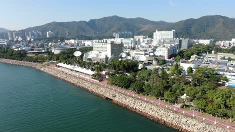 cluster of satellite broadcast dishes on hong kong, aerial view