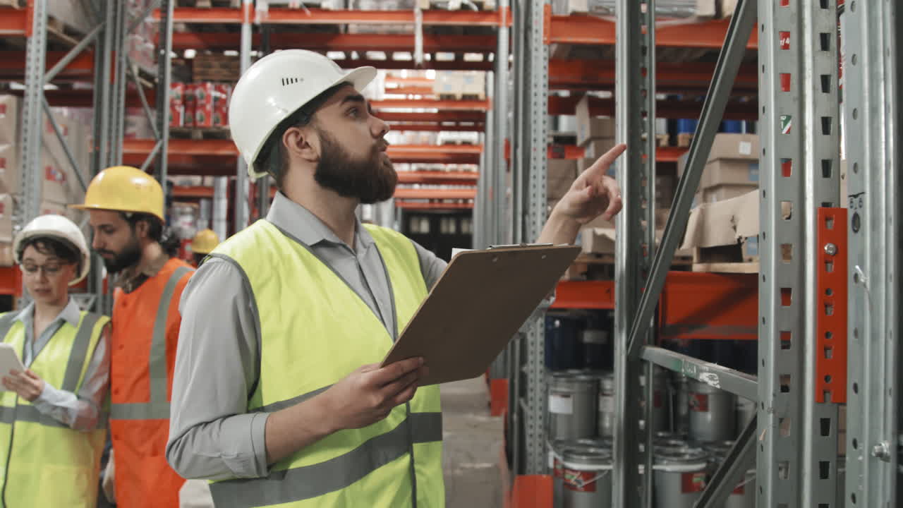 Slowmo of People Working in Warehouse