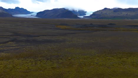 Aerial-revealing-shot-of-the-beautiful-vast-Glacier-landscape-in-Iceland