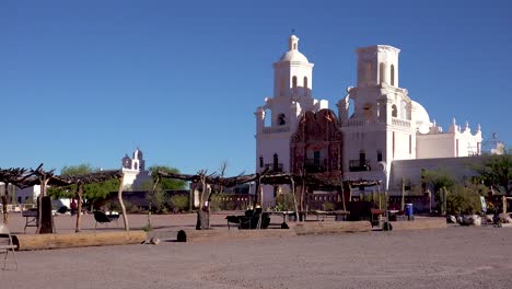 a beautiful establishing shot of mission san xavier del bac a historic spanish catholic mission near tucson arizona