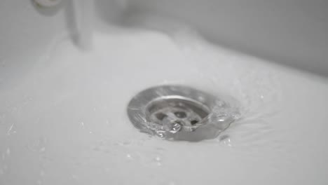 water draining in a sink