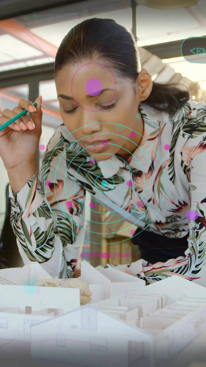 Vertical video: Designer scanning model with green pencil, UI converging on face for analysis