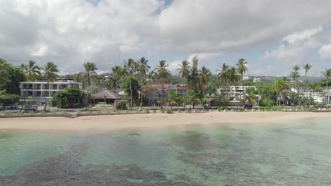 Aerial-Slide-view-of-Playa-Town-and-Beach,-Las-Terrenas,-Dominican-Republic