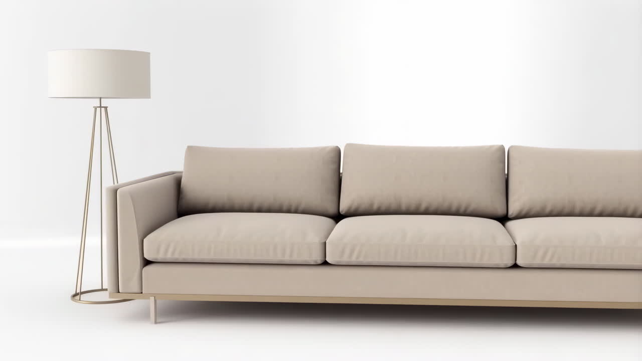 A modern beige sofa and floor lamp against a white background