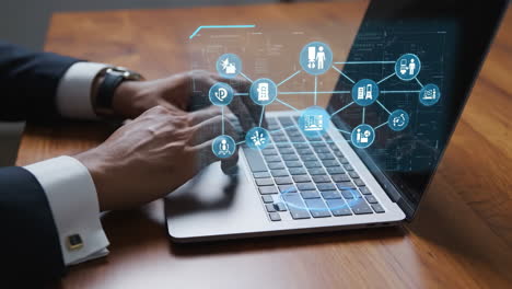 professional using laptop with digital network and technology icons