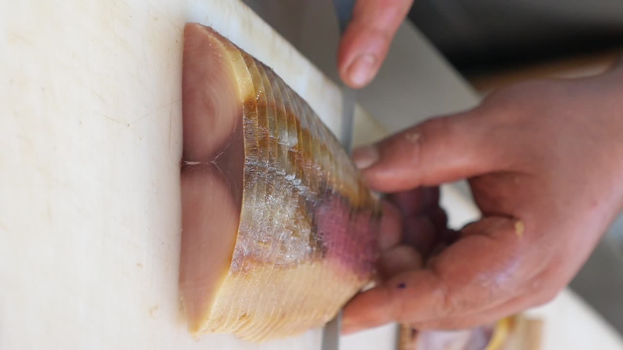 Cutting Smoked Mackerel